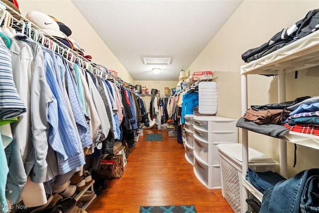 7700 Sparrow Flight Dr, Seven Hills, OH 44131 - walk in closet featuring attic access and wood finished floors