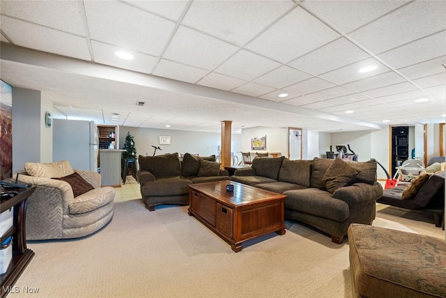 7700 Sparrow Flight Dr, Seven Hills, OH 44131 - living room with light carpet, recessed lighting, and a paneled ceiling