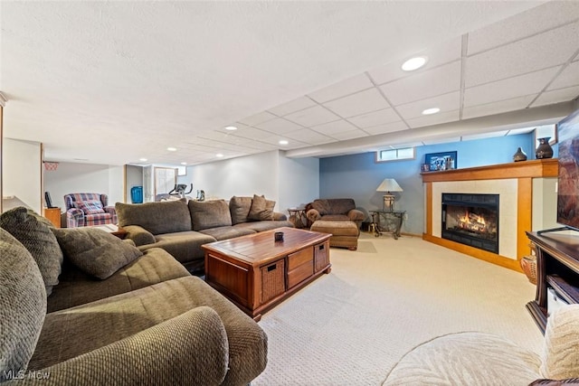 7700 Sparrow Flight Dr, Seven Hills, OH 44131 - carpeted living area with a tiled fireplace