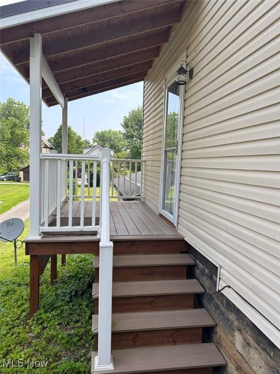330 E Main St, East Palestine, OH 44413 - wooden terrace featuring stairs