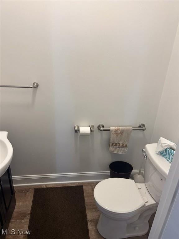 330 E Main St, East Palestine, OH 44413 - bathroom with toilet and wood finished floors