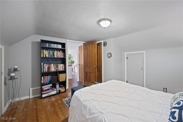 5910 Gerald Ave, Parma, OH 44129 - bedroom with wood finished floors and vaulted ceiling