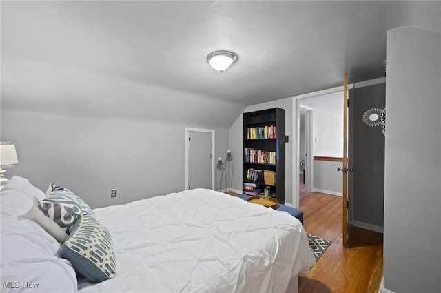 5910 Gerald Ave, Parma, OH 44129 - bedroom with wood finished floors and vaulted ceiling