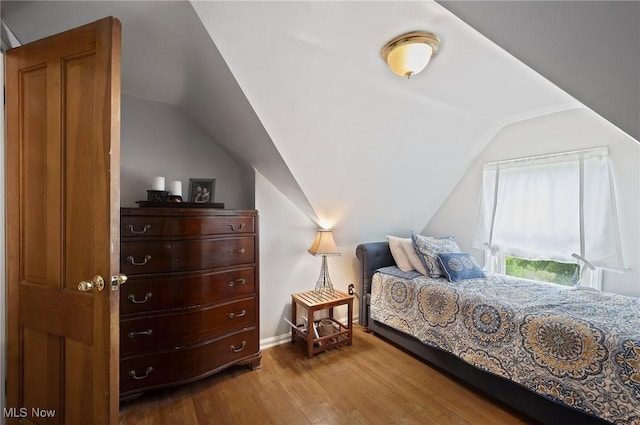 5910 Gerald Ave, Parma, OH 44129 - bedroom featuring lofted ceiling and hardwood / wood-style flooring