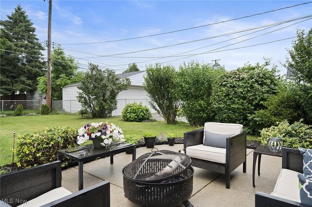 5910 Gerald Ave, Parma, OH 44129 - view of patio featuring an outdoor living space with a fire pit