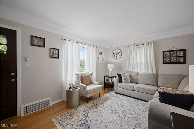 5910 Gerald Ave, Parma, OH 44129 - living room with light wood-style floors and baseboards