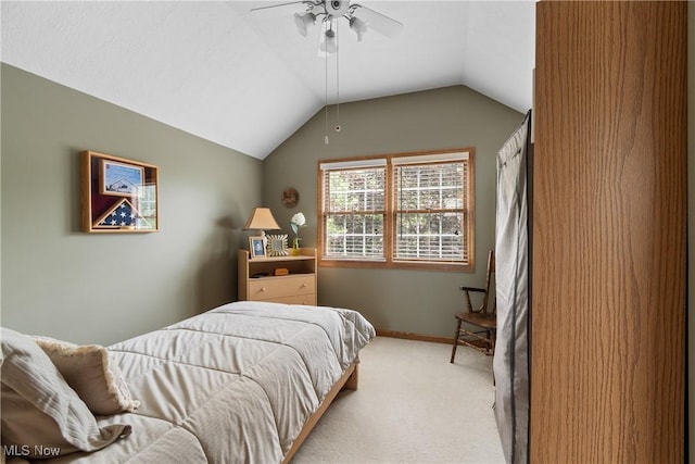 637 N Ridgecliff St, Tallmadge, OH 44278 - bedroom featuring light colored carpet, lofted ceiling, and a ceiling fan