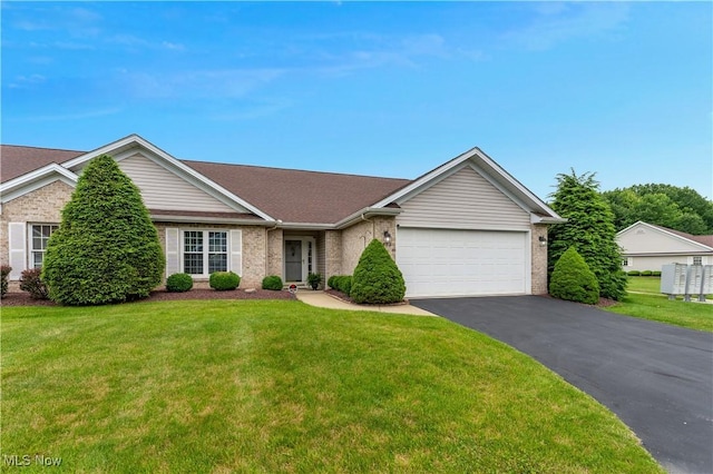 7876 Walnut St Unit B, Boardman, OH 44512 - ranch-style home featuring a garage, asphalt driveway, a front yard, and brick siding