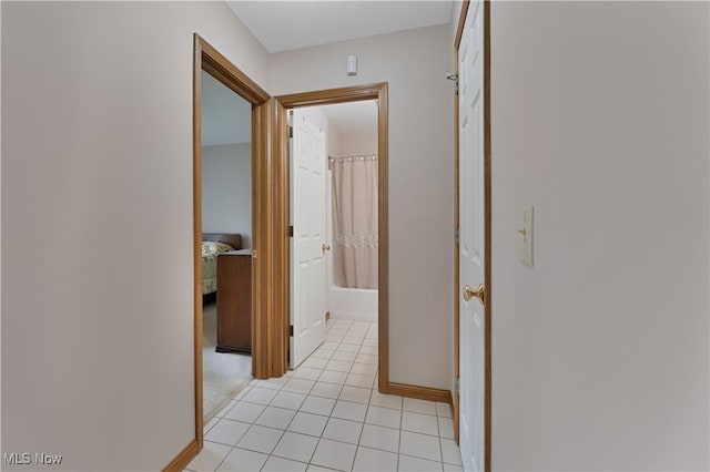 7876 Walnut St Unit B, Boardman, OH 44512 - hallway with light tile patterned floors and baseboards