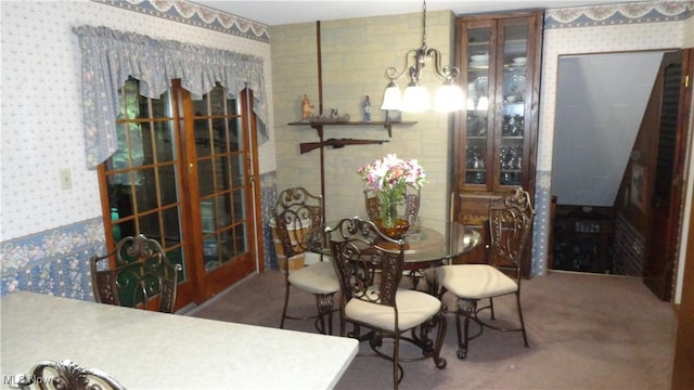 3981 Washington School Rd, New Cumberland, WV 26047 - dining room featuring wallpapered walls, a chandelier, and carpet floors