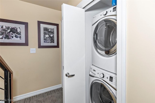 1569 E 118th St Unit B, Cleveland, OH 44106 - laundry area featuring stacked washer and clothes dryer and carpet flooring