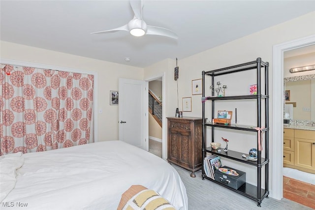 1569 E 118th St Unit B, Cleveland, OH 44106 - bedroom with connected bathroom and a ceiling fan