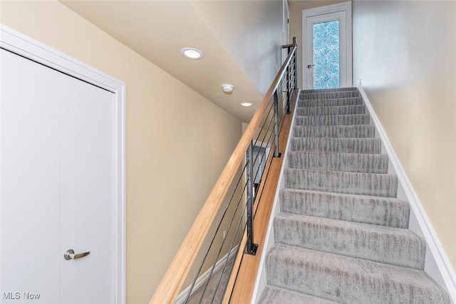 1569 E 118th St Unit B, Cleveland, OH 44106 - staircase featuring recessed lighting and wood finished floors