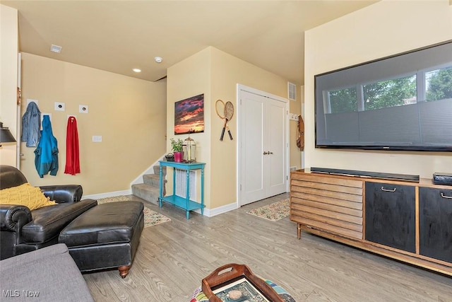 1569 E 118th St Unit B, Cleveland, OH 44106 - living area featuring wood finished floors and stairs