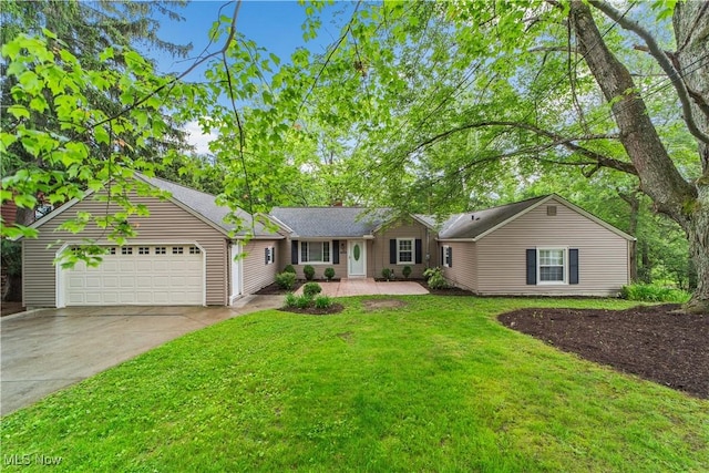 3965 Ellendale Rd, Chagrin Falls, OH 44022 - ranch-style house featuring a garage, concrete driveway, and a front lawn