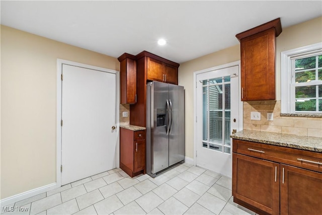 3965 Ellendale Rd, Chagrin Falls, OH 44022 - kitchen with stainless steel fridge, decorative backsplash, light stone countertops, and recessed lighting