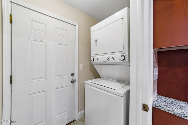 3965 Ellendale Rd, Chagrin Falls, OH 44022 - washroom featuring stacked washer / drying machine and baseboards