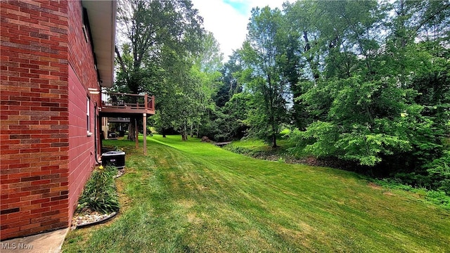 112 Laurel Ln, Washington, WV 26181 - view of green lawn featuring a deck