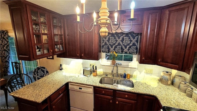 112 Laurel Ln, Washington, WV 26181 - kitchen featuring dishwasher, reddish brown cabinets, a chandelier, decorative backsplash, and light stone counters