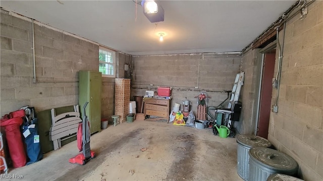 112 Laurel Ln, Washington, WV 26181 - garage featuring concrete block wall and a garage door opener