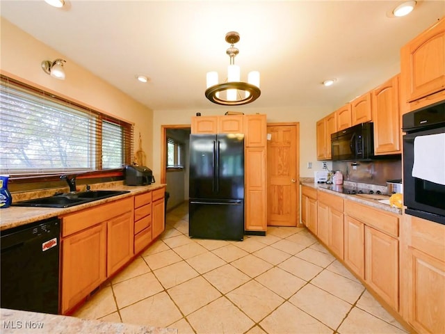 32701 Gundy Ridge Rd, Bowerston, OH 44695 - kitchen featuring black appliances, light brown cabinets, light tile patterned flooring, light countertops, and hanging light fixtures
