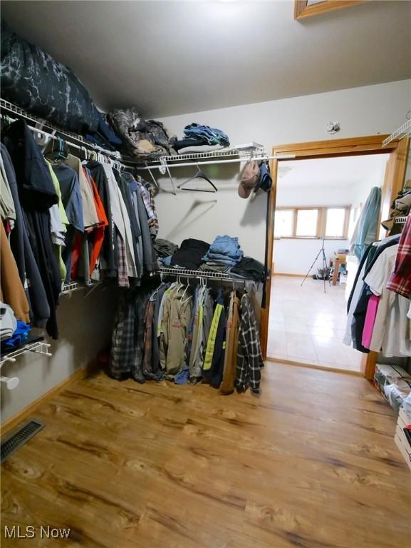 32701 Gundy Ridge Rd, Bowerston, OH 44695 - spacious closet featuring wood finished floors