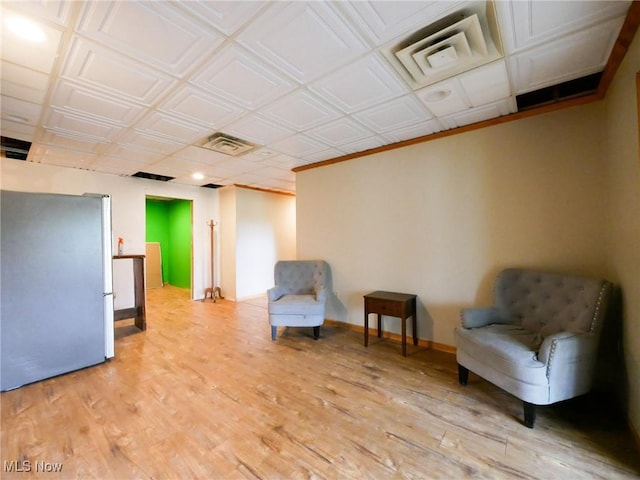 32701 Gundy Ridge Rd, Bowerston, OH 44695 - sitting room featuring light wood-style flooring and an ornate ceiling