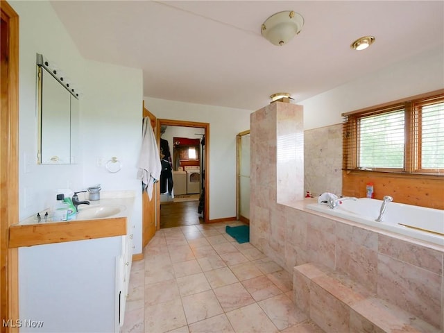 32701 Gundy Ridge Rd, Bowerston, OH 44695 - bathroom with a bath, vanity, a shower with door, washing machine and clothes dryer, and tile patterned flooring