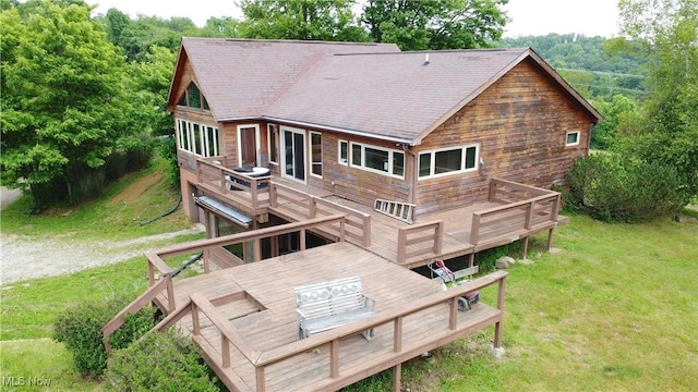 32701 Gundy Ridge Rd, Bowerston, OH 44695 - rear view of property featuring a deck, a lawn, and roof with shingles