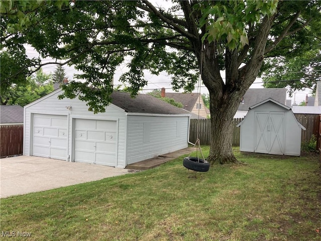 7611 Liberty Ave, Parma, OH 44129 - view of yard with an outbuilding and a garage