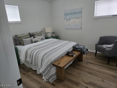 7611 Liberty Ave, Parma, OH 44129 - bedroom featuring wood finished floors