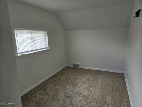 7611 Liberty Ave, Parma, OH 44129 - bonus room with carpet flooring and lofted ceiling