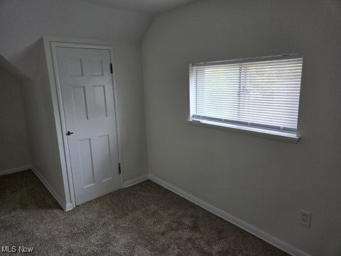 7611 Liberty Ave, Parma, OH 44129 - bonus room featuring vaulted ceiling and carpet