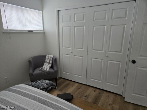 7611 Liberty Ave, Parma, OH 44129 - bedroom featuring wood finished floors and a closet