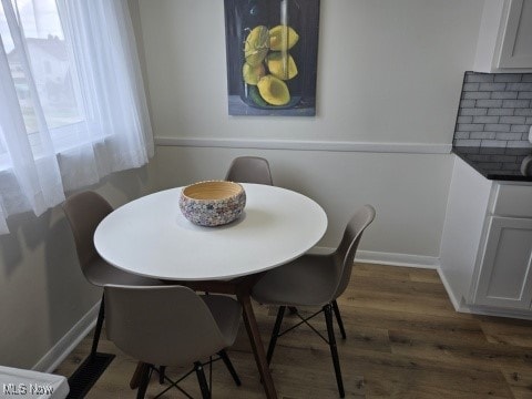 7611 Liberty Ave, Parma, OH 44129 - dining area featuring wood finished floors and baseboards