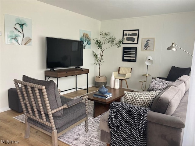 7611 Liberty Ave, Parma, OH 44129 - living area featuring wood finished floors and baseboards