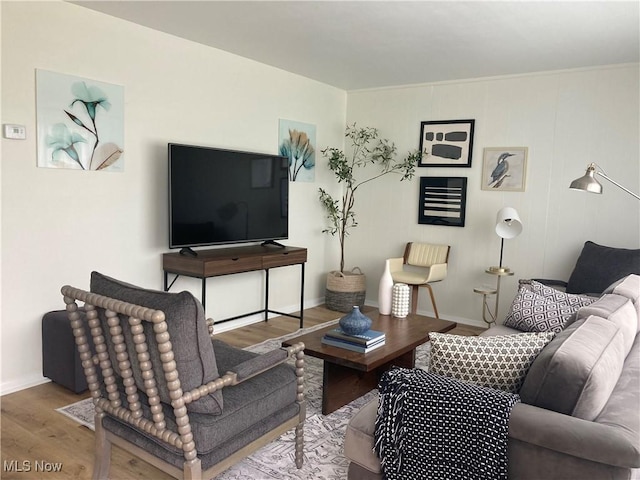 7611 Liberty Ave, Parma, OH 44129 - living room featuring wood finished floors and baseboards