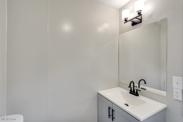 1017 Smith Ave SW, Canton, OH 44706 - bathroom with vanity and toilet
