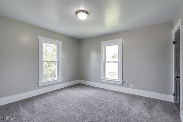 1017 Smith Ave SW, Canton, OH 44706 - carpeted spare room with baseboards