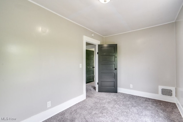 1017 Smith Ave SW, Canton, OH 44706 - unfurnished room with carpet floors and ornamental molding
