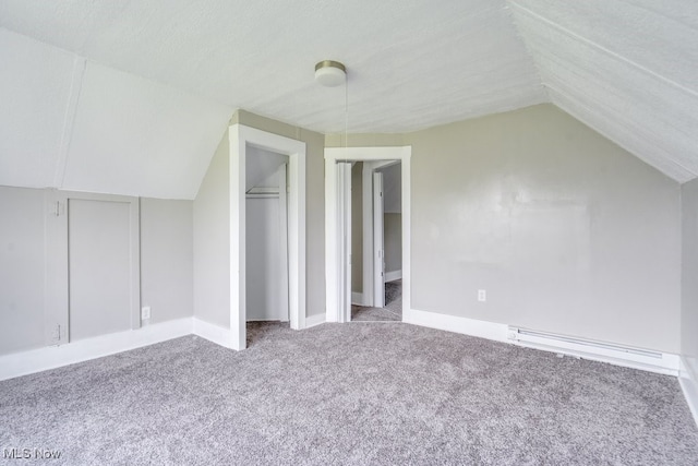 1017 Smith Ave SW, Canton, OH 44706 - bonus room with carpet, vaulted ceiling, and a baseboard radiator