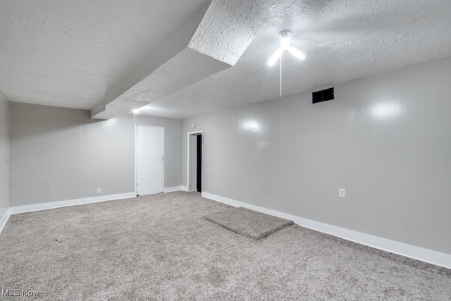1017 Smith Ave SW, Canton, OH 44706 - finished below grade area featuring a textured ceiling and carpet