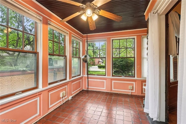 1575 E 108th St, Cleveland, OH 44106 - unfurnished sunroom featuring a decorative wall, plenty of natural light, and tile patterned floors