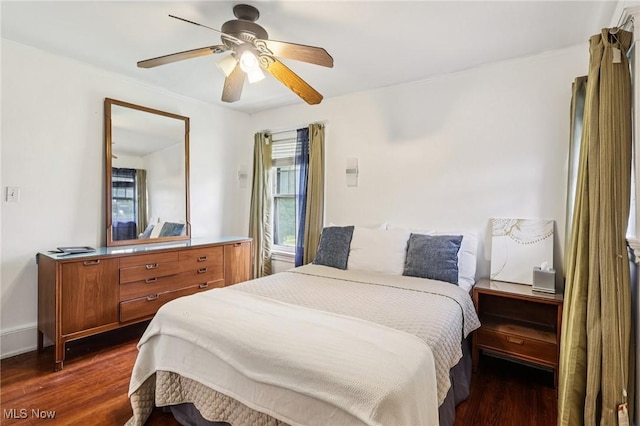 1575 E 108th St, Cleveland, OH 44106 - bedroom featuring dark wood-style flooring and ceiling fan