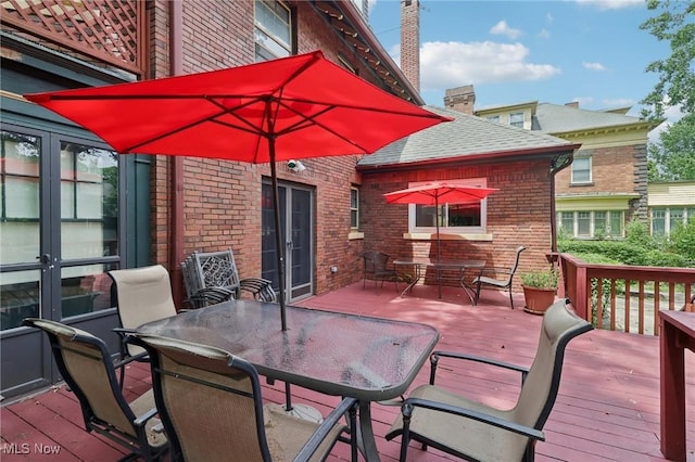 1575 E 108th St, Cleveland, OH 44106 - deck with outdoor dining space and french doors