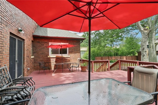 1575 E 108th St, Cleveland, OH 44106 - wooden terrace featuring outdoor dining space