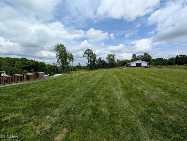 3439 Rough And Ready Rd, New Concord, OH 43762 - view of green lawn featuring a rural view and a garage