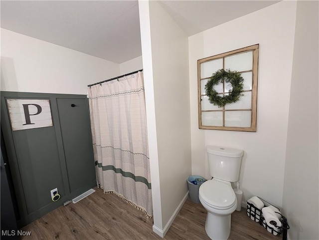3439 Rough And Ready Rd, New Concord, OH 43762 - full bath featuring wood finished floors and a shower with curtain