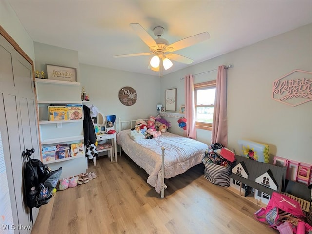 3439 Rough And Ready Rd, New Concord, OH 43762 - bedroom with wood finished floors and ceiling fan