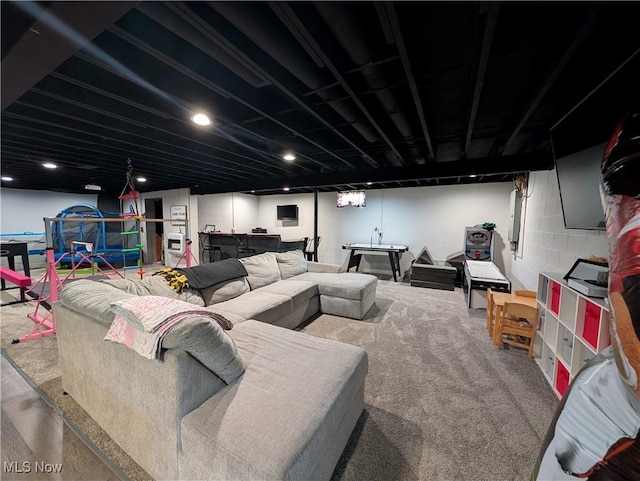 3439 Rough And Ready Rd, New Concord, OH 43762 - living area featuring bar and concrete block wall
